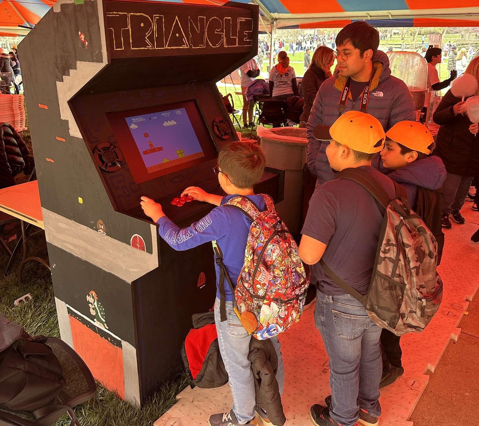 Arcade Machine at the EOH with children playing games on it